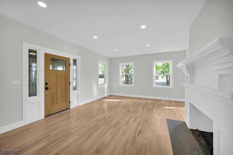 Empty room, Fireplace, Interior, Recessed Lighting, Wood Texture Flooring