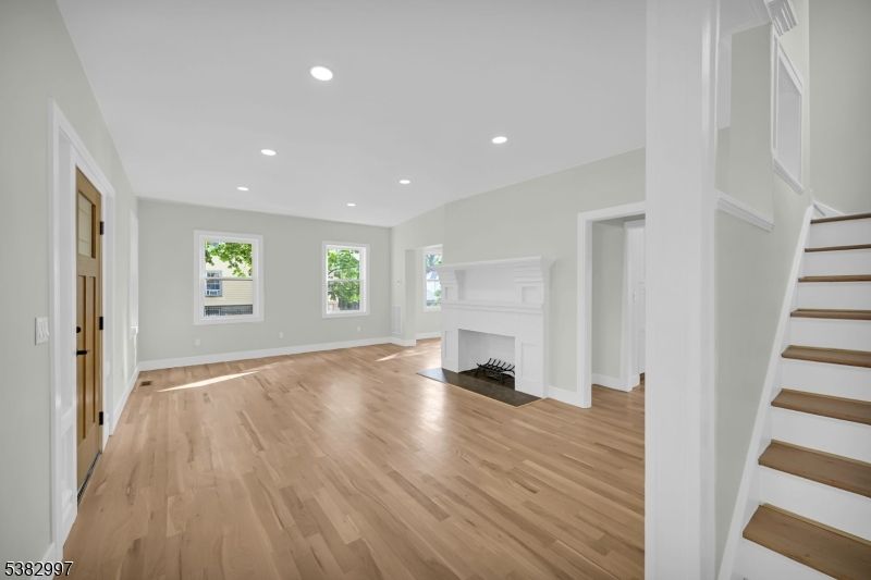 Empty room, Fireplace, Interior, Recessed Lighting, Wood Texture Flooring