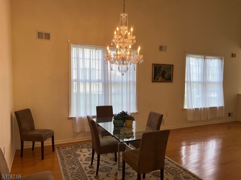 Chandelier, Dining room, Interior, Wood Texture Flooring