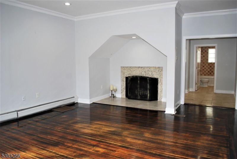 Empty room, Fireplace, Interior, Recessed Lighting, Wood Texture Flooring