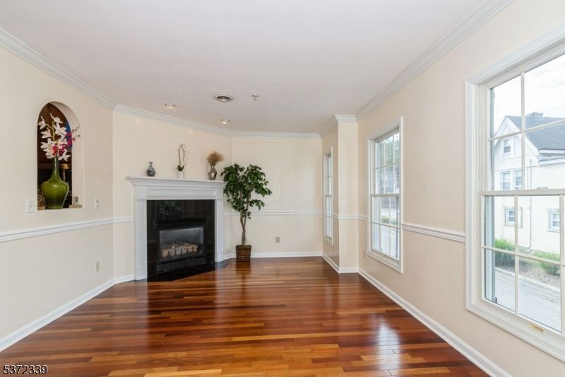 Empty room, Fireplace, Interior, Recessed Lighting, Wood Texture Flooring