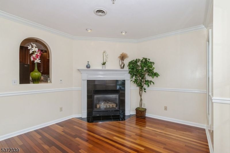 Fireplace, Interior, Recessed Lighting, Wood Texture Flooring