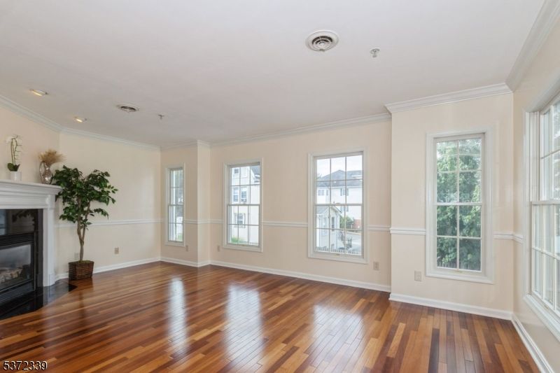 Empty room, Fireplace, Interior, Recessed Lighting, Wood Texture Flooring