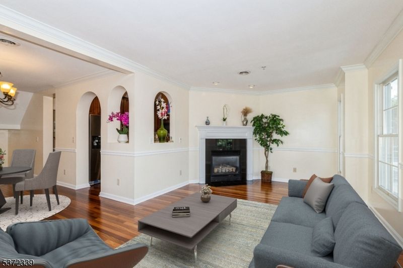 Chandelier, Dining room, Fireplace, Interior, Living room, Recessed Lighting, Wood Texture Flooring