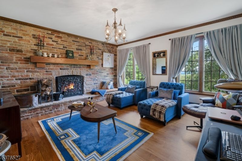 Fireplace, Interior, Living room, Pendant Lights, Stone Walls, Wood Texture Flooring