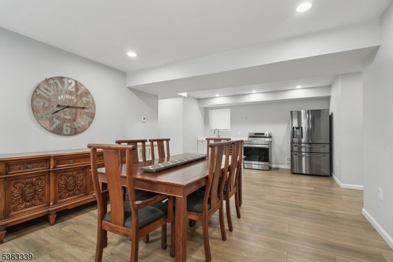 Dining room, Interior, Kitchen, Recessed Lighting, Stainless Steel Appliances, Wood Texture Flooring