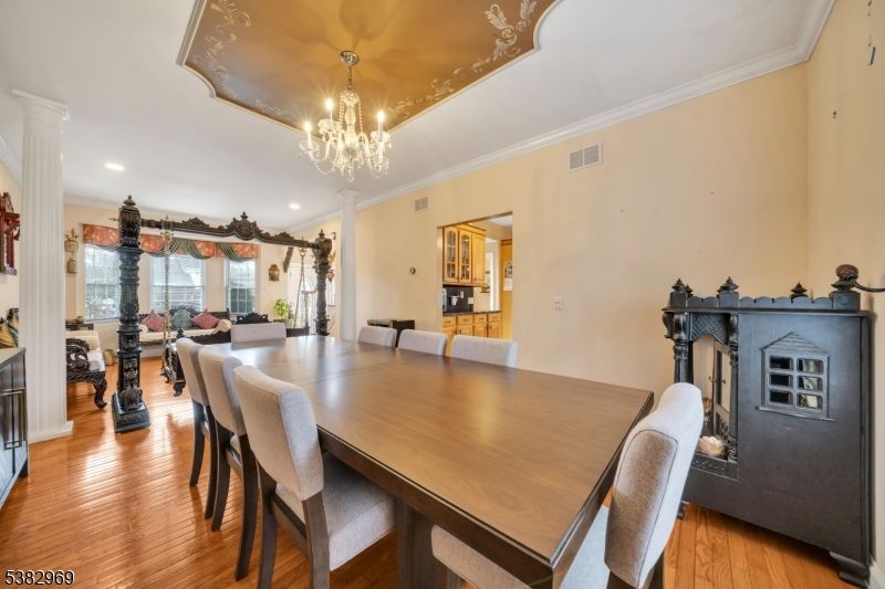 Chandelier, Dining room, Fireplace, Interior, Recessed Lighting, Wood Texture Flooring