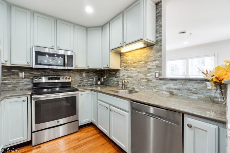Interior, Kitchen, Recessed Lighting, Stainless Steel Appliances, Wood Texture Flooring
