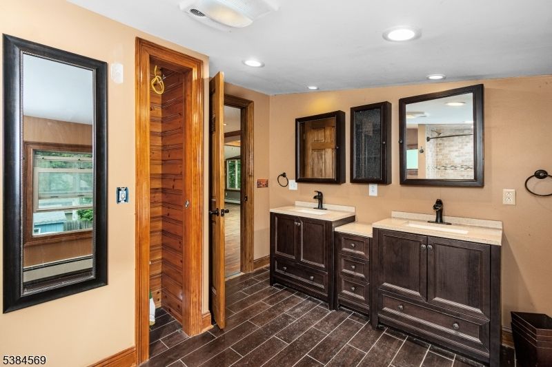 Bathroom, Dual Sink Vanities, Interior, Recessed Lighting, Wood Texture Flooring