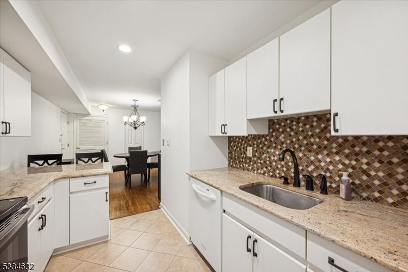 Chandelier, Dining room, Interior, Kitchen, Living room, Recessed Lighting, Wood Texture Flooring
