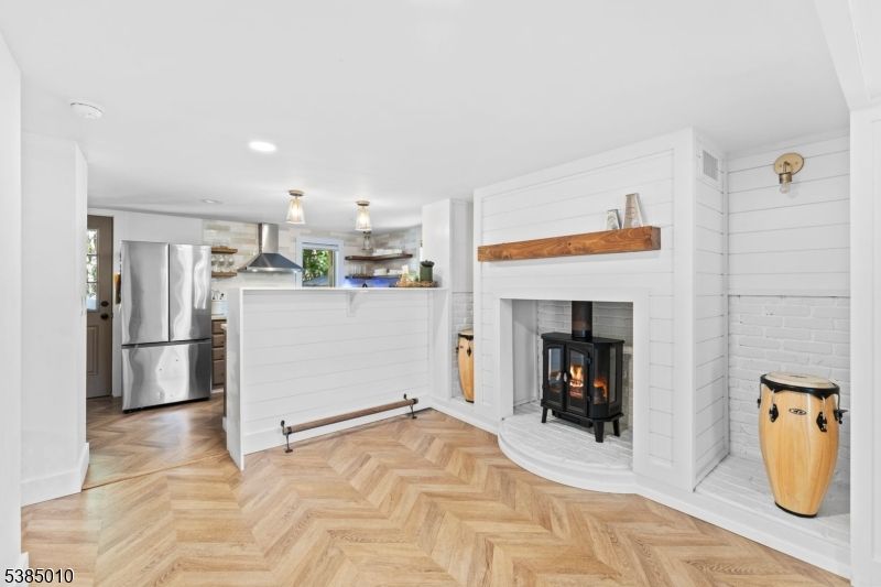 Fireplace, Interior, Kitchen, Pendant Lights, Recessed Lighting, Stainless Steel Appliances, Wood Texture Flooring