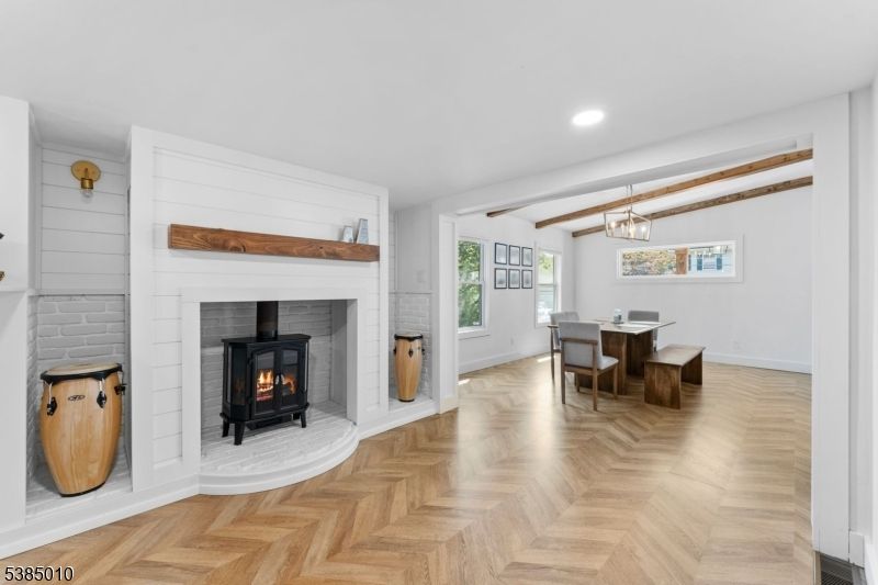 Dining room, Fireplace, Interior, Pendant Lights, Recessed Lighting, Wood Texture Flooring