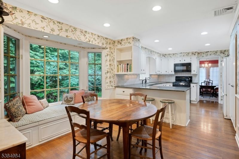 Dining room, Interior, Kitchen, Recessed Lighting, Stainless Steel Appliances, Wood Texture Flooring