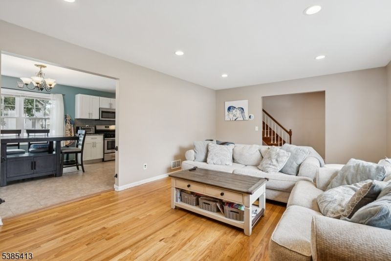 Chandelier, Dining room, Interior, Kitchen, Living room, Recessed Lighting, Wood Texture Flooring