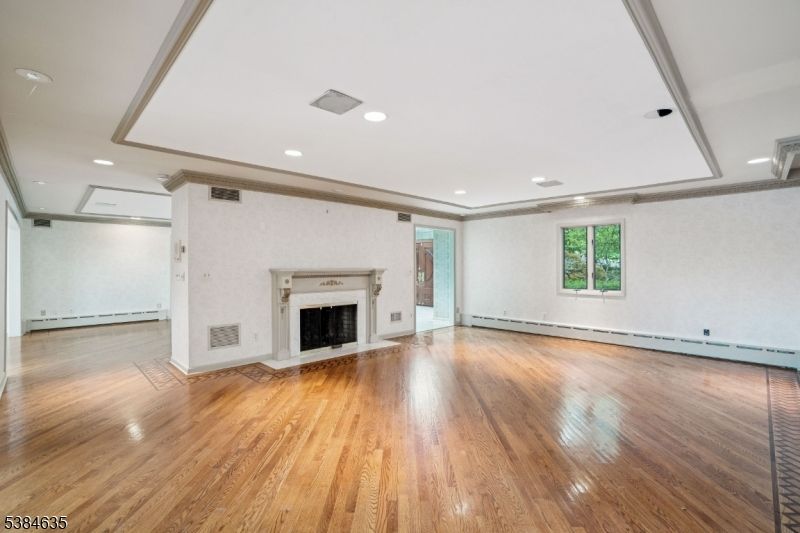 Empty room, Fireplace, Interior, Recessed Lighting, Wood Texture Flooring