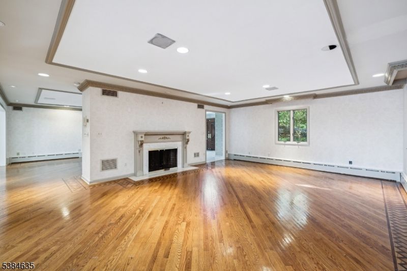 Empty room, Fireplace, Interior, Recessed Lighting, Wood Texture Flooring