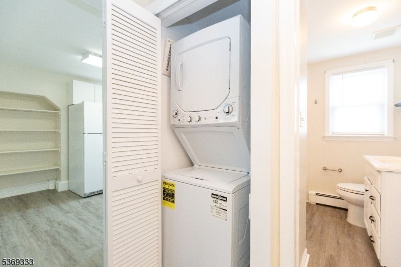 Bathroom, Interior, Utility Closets, Washer, Wood Texture Flooring