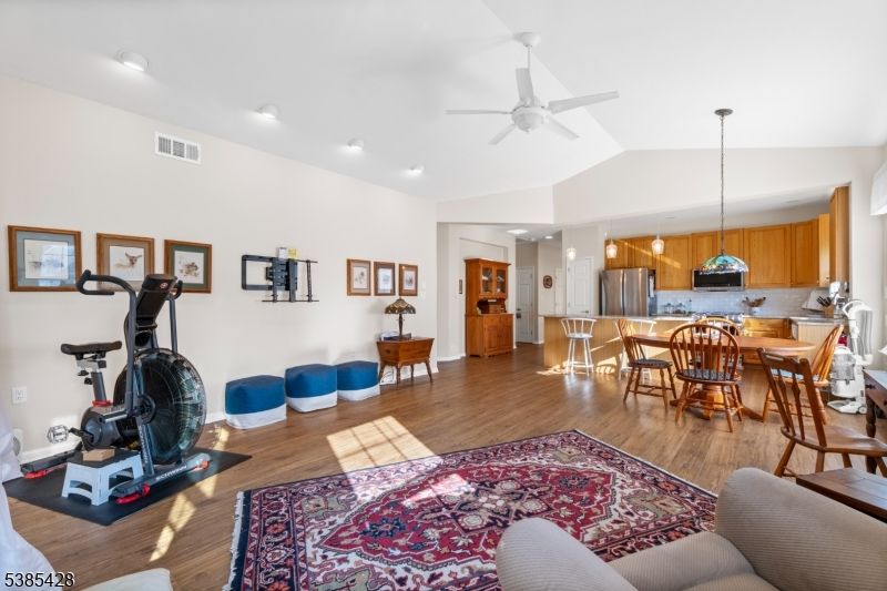 Dining room, Fitness Equipment, Interior, Kitchen, Pendant Lights, Recessed Lighting, Wood Texture Flooring