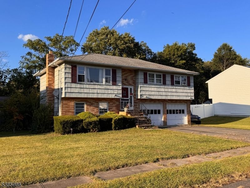 Attached, Exterior, Facade, Brick Facade, Raised Ranch