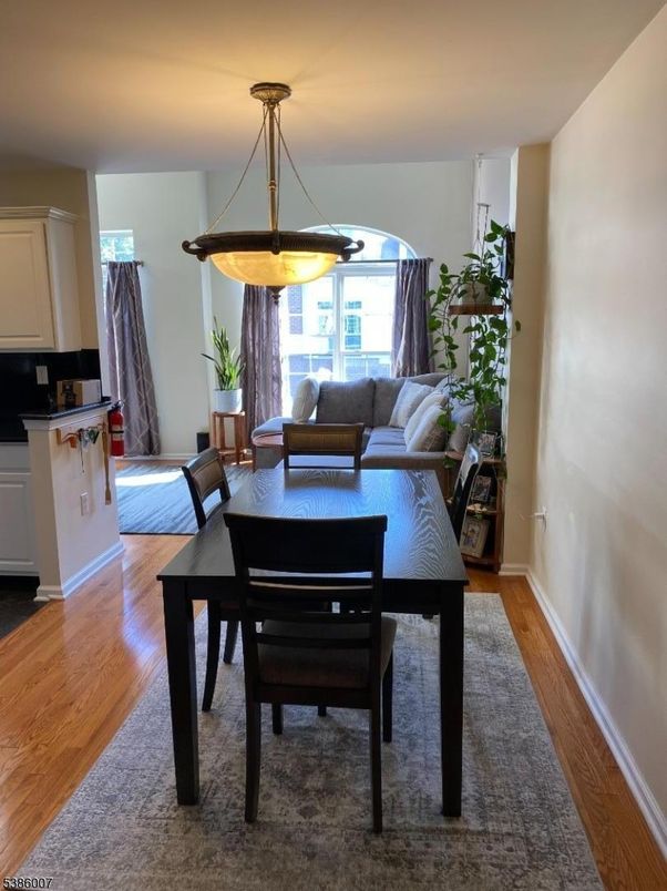 Dining room, Interior, Living room, Pendant Lights, Wood Texture Flooring