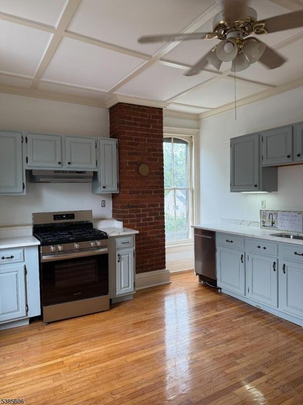 Interior, Kitchen, Stainless Steel Appliances, Stone Walls, Wood Texture Flooring