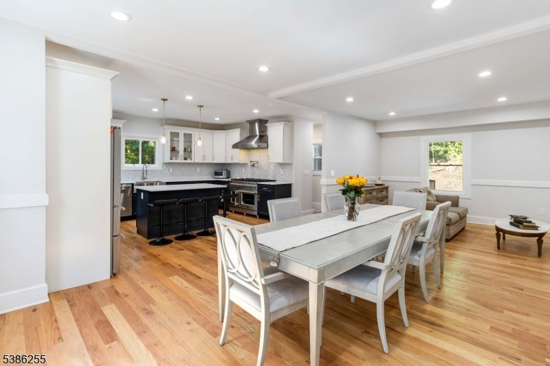 Dining room, Interior, Kitchen, Pendant Lights, Recessed Lighting, Stainless Steel Appliances, Wood Texture Flooring