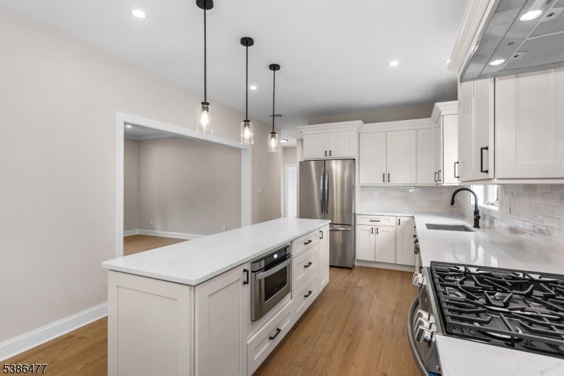 Interior, Kitchen, Pendant Lights, Recessed Lighting, Stainless Steel Appliances, Wood Texture Flooring