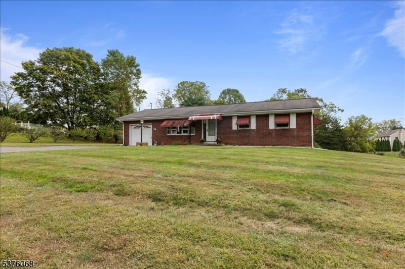 Attached, Backyard, Exterior, Facade, Brick Facade, Ranch