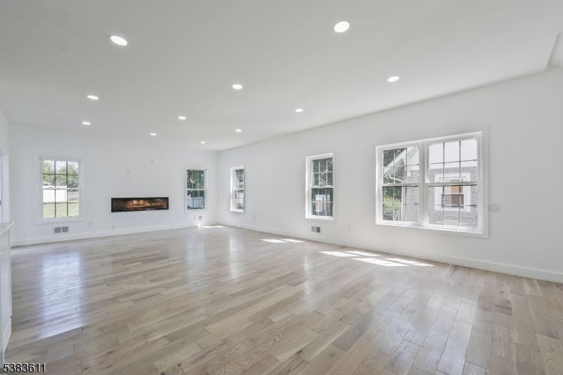 Empty room, Fireplace, Interior, Recessed Lighting, Wood Texture Flooring