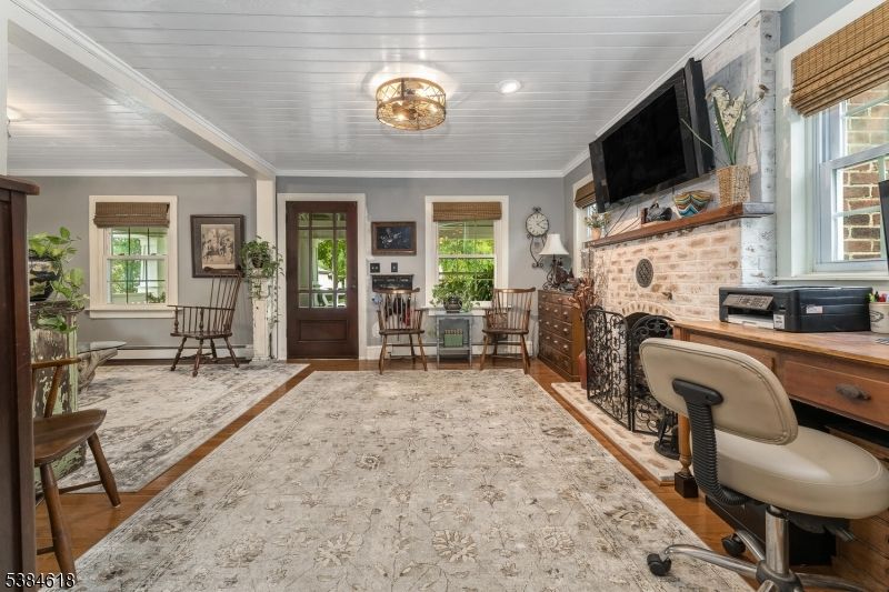 Fireplace, Home Office, Interior, Recessed Lighting, Stone Walls, Wood Texture Flooring