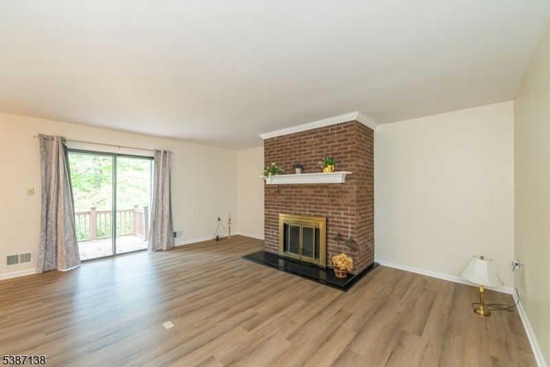 Empty room, Fireplace, Interior, Stone Walls, Wood Texture Flooring