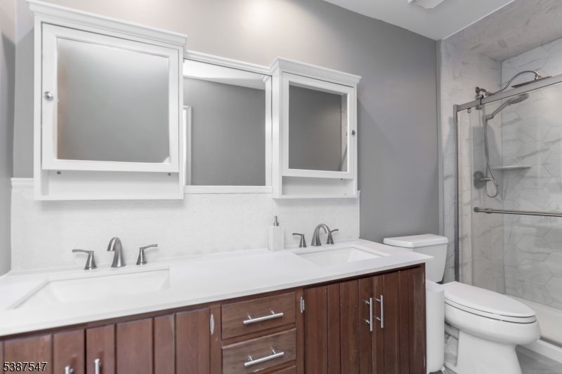 Bathroom, Dual Sink Vanities, Glass Shower, Interior, Marble Walls