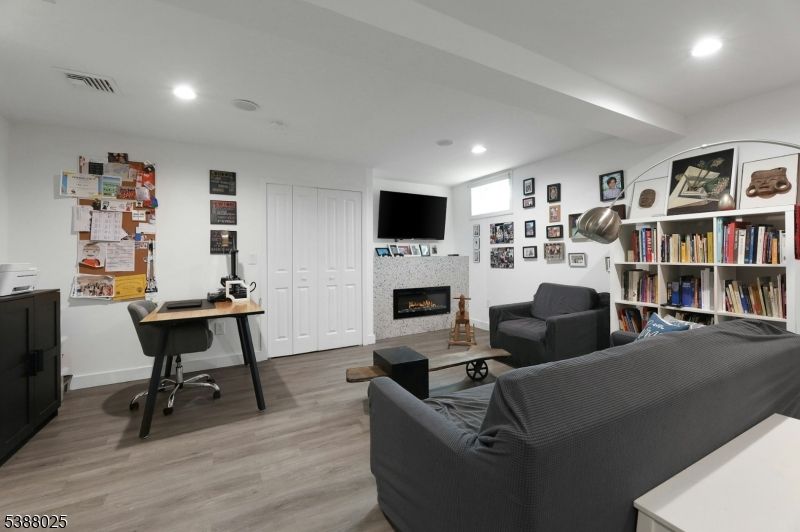 Fireplace, Interior, Living room, Recessed Lighting, Wood Texture Flooring