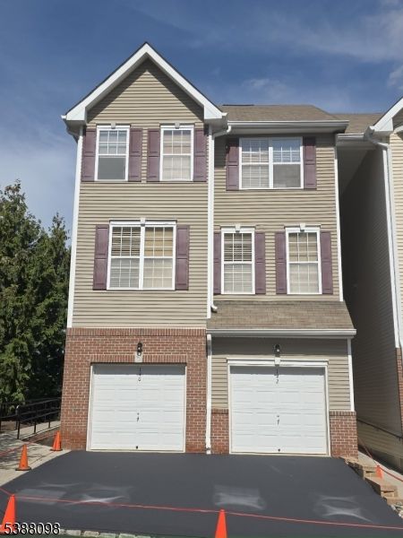 Attached, Exterior, Facade, Brick Facade, Rowhouse