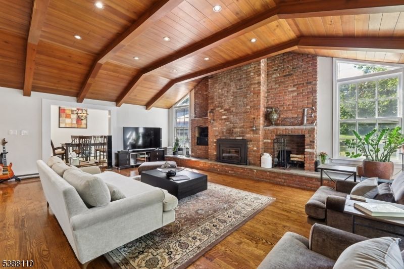 Fireplace, Interior, Living room, Recessed Lighting, Stone Walls, Wooden Beams, Wooden Ceilings, Wood Texture Flooring