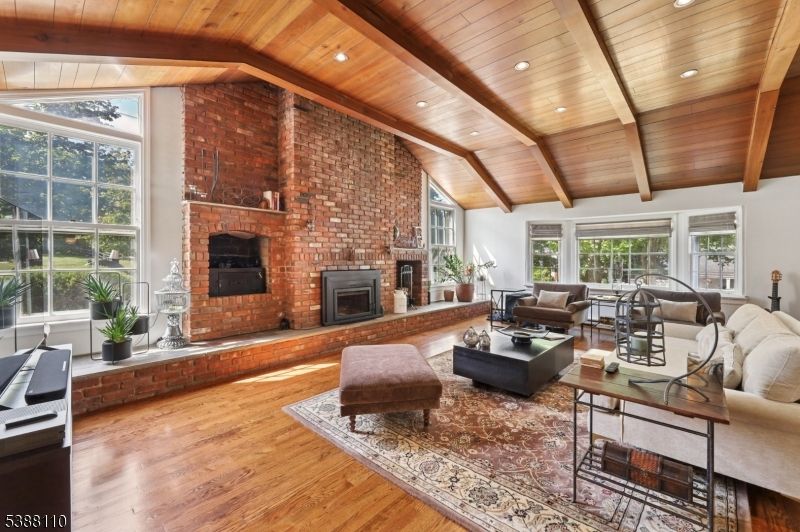 Fireplace, Interior, Living room, Recessed Lighting, Stone Walls, Wooden Beams, Wooden Ceilings, Wood Texture Flooring