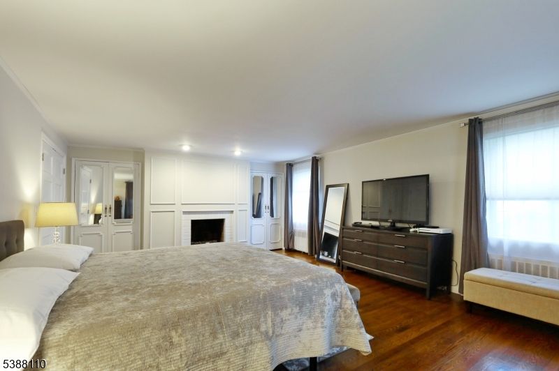 Bedroom, Fireplace, Interior, Recessed Lighting, Wood Texture Flooring