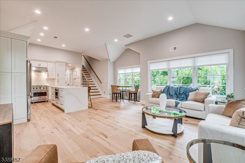 Dining room, Interior, Kitchen, Living room, Recessed Lighting, Stainless Steel Appliances, Wood Texture Flooring