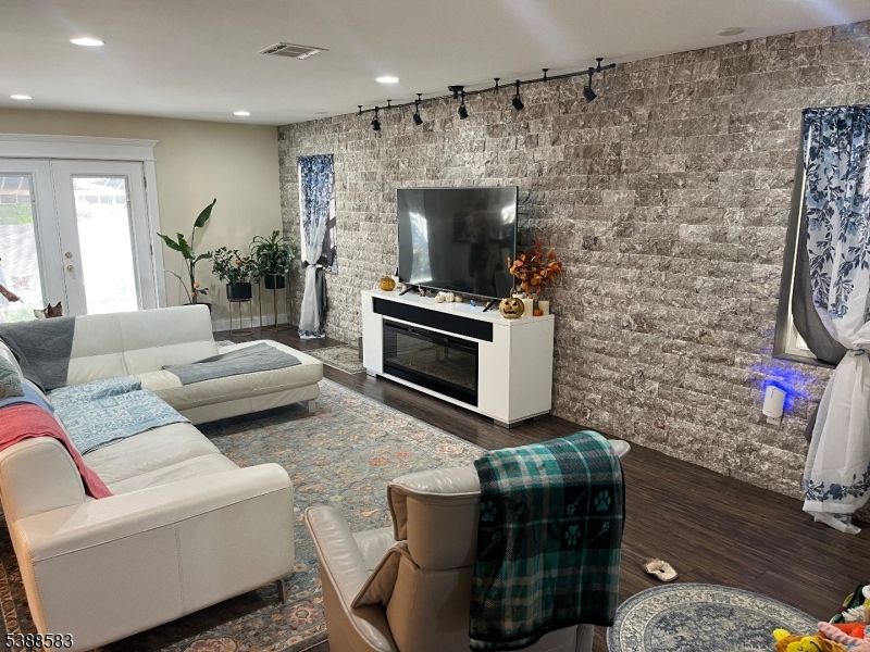 Interior, Living room, Recessed Lighting, Stone Walls, Wood Texture Flooring