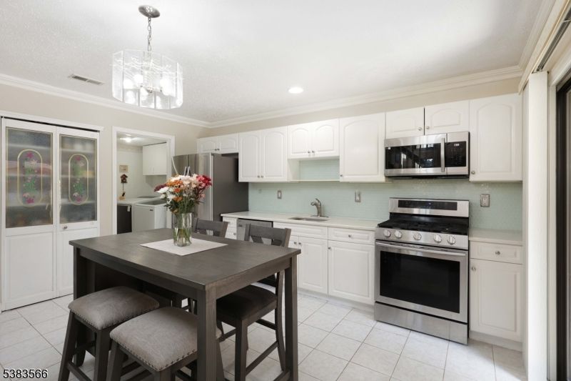 Chandelier, Dining room, Interior, Kitchen, Recessed Lighting, Stainless Steel Appliances