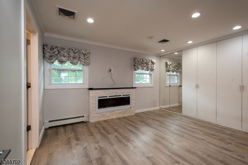 Empty room, Fireplace, Interior, Recessed Lighting, Wood Texture Flooring