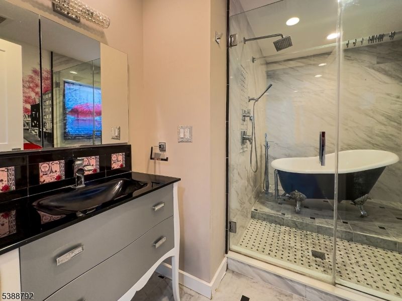 Bathroom, Free Standing Baths, Glass Shower, Interior, Marble, Marble Walls, Recessed Lighting