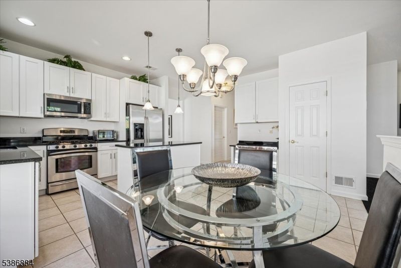 Chandelier, Dining room, Interior, Kitchen, Pendant Lights, Recessed Lighting, Stainless Steel Appliances