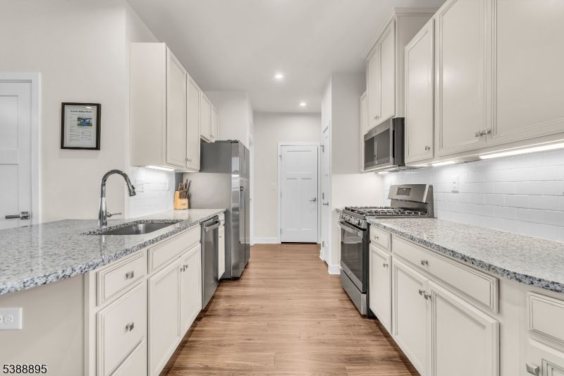 Interior, Kitchen, Recessed Lighting, Stainless Steel Appliances, Wood Texture Flooring