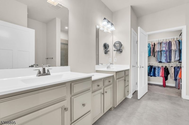 Bathroom, Dual Sink Vanities, Interior, Recessed Lighting, Walk-in Closets