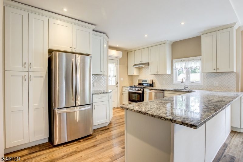 Interior, Kitchen, Recessed Lighting, Stainless Steel Appliances, Wood Texture Flooring