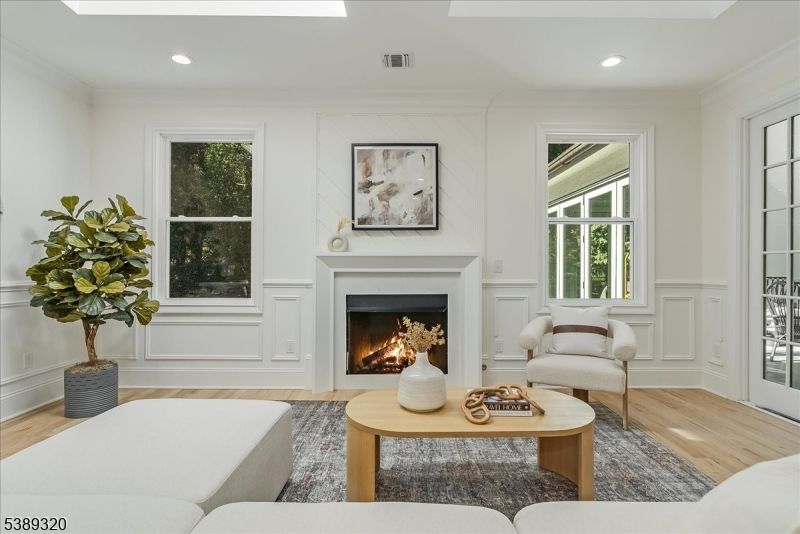 Fireplace, Interior, Living room, Recessed Lighting, Wood Texture Flooring