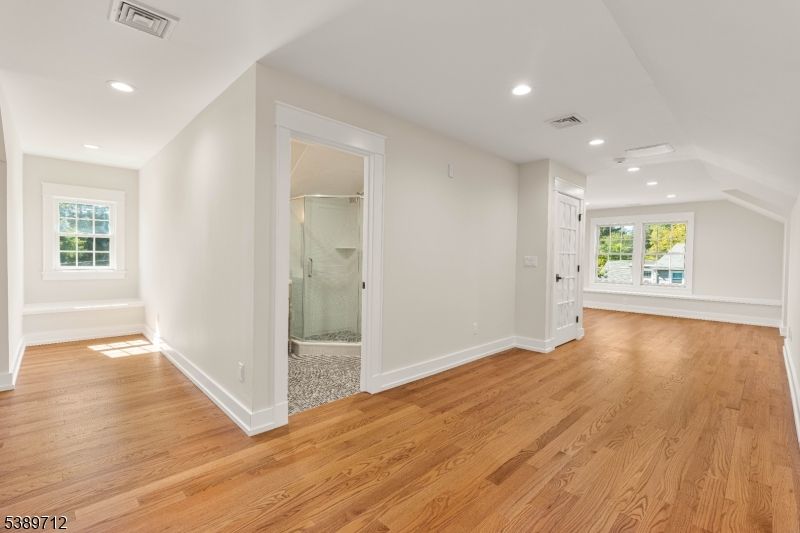 Bathroom, Empty room, Glass Shower, Interior, Recessed Lighting, Wood Texture Flooring