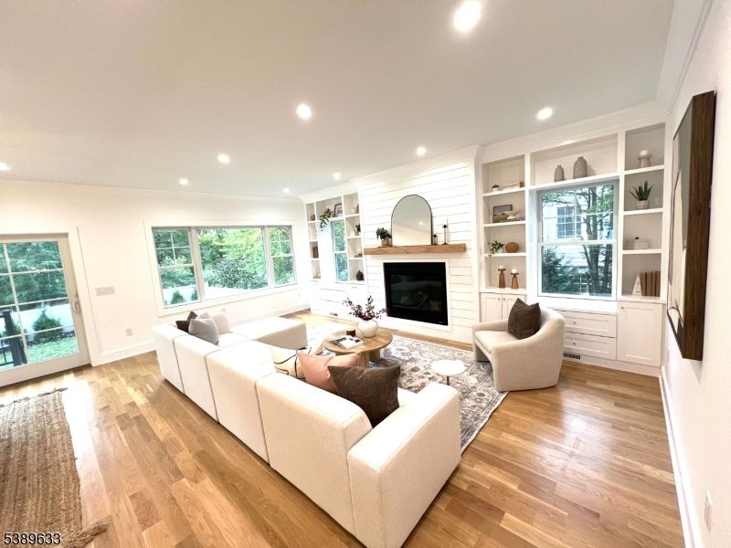 Fireplace, Interior, Living room, Recessed Lighting, Wood Texture Flooring