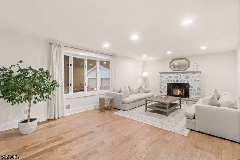 Fireplace, Interior, Living room, Recessed Lighting, Wood Texture Flooring